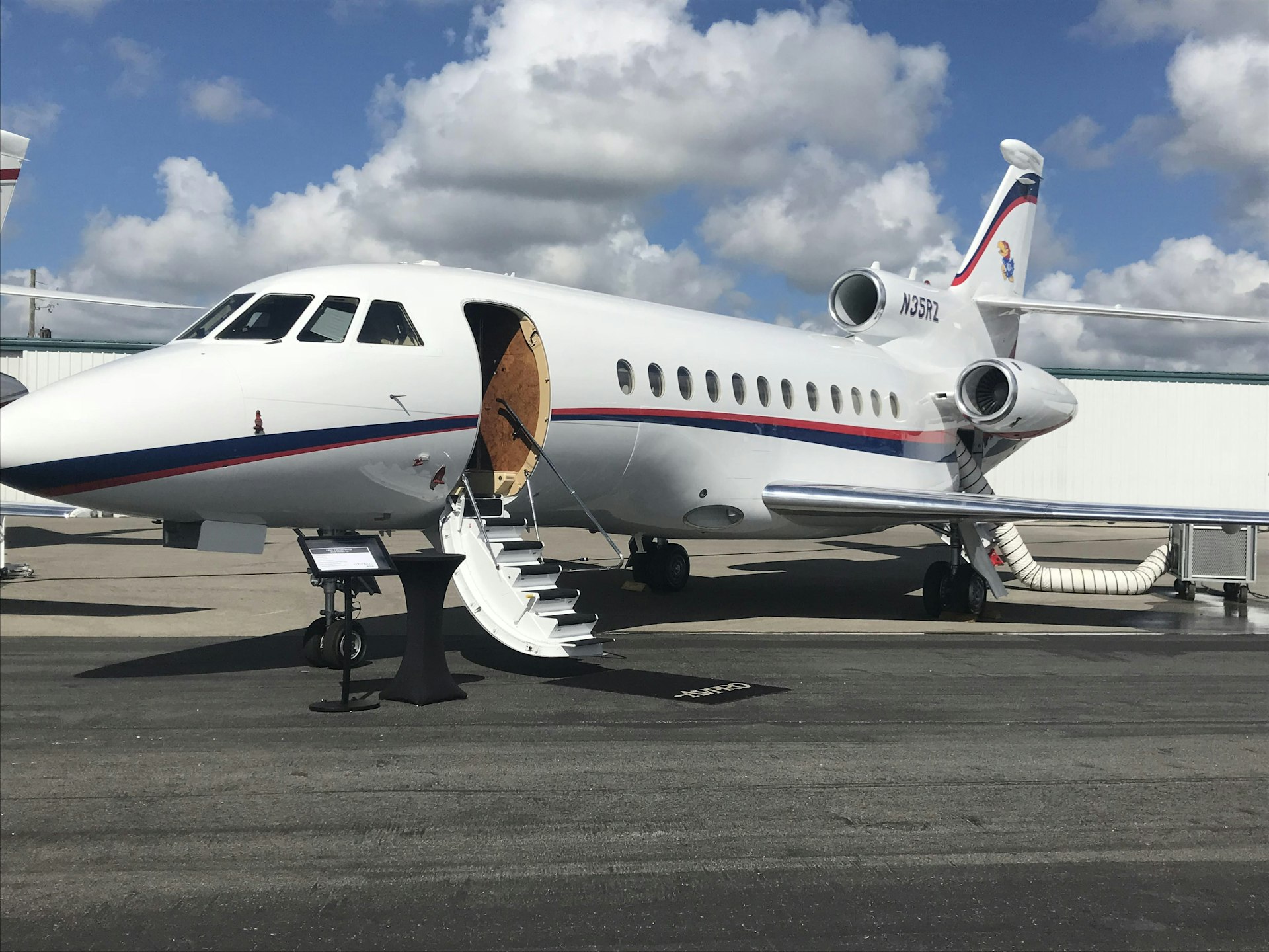 Heavy jet with boarding stairs